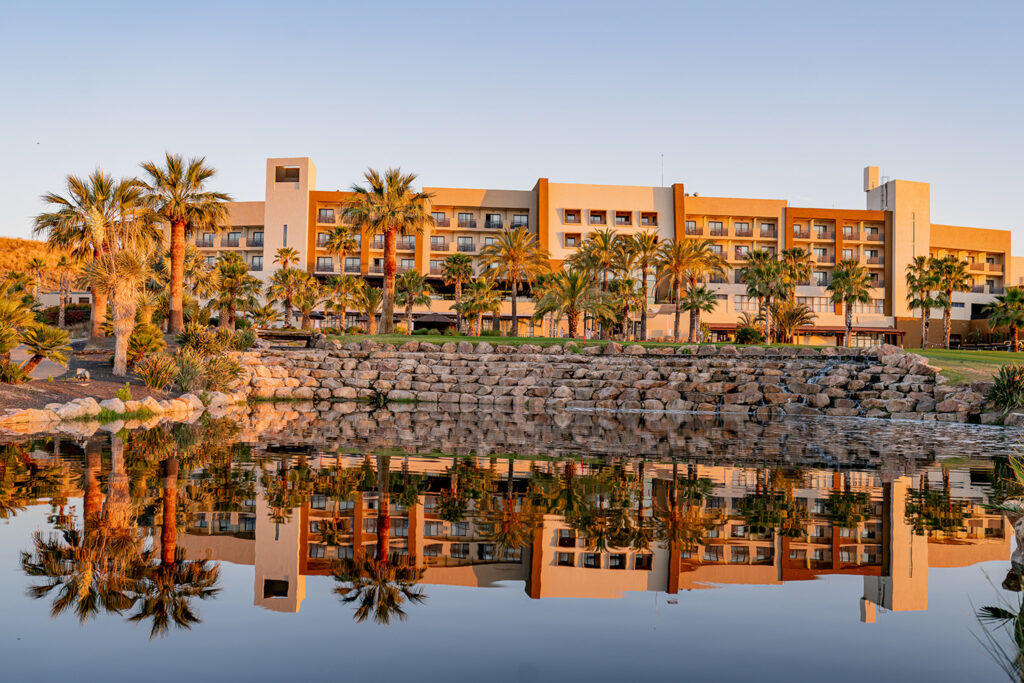 Valle del Este hotel in the distance over water