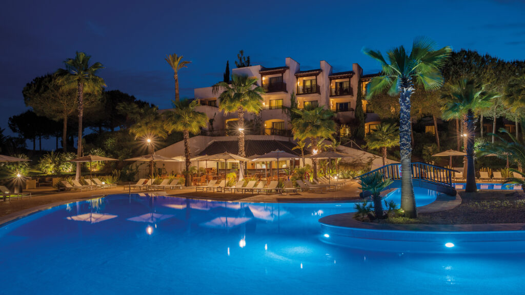 Pool and hotel at night