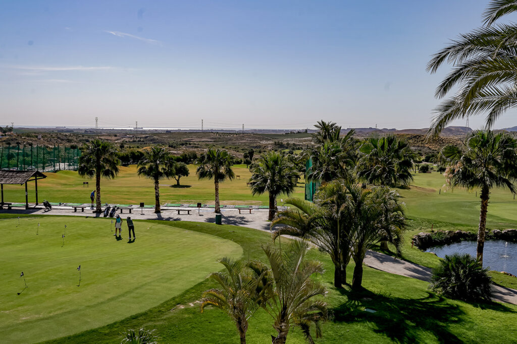 Golf course with trees in a row