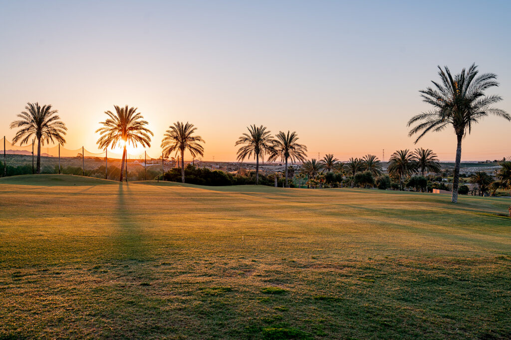 golf course with sunset